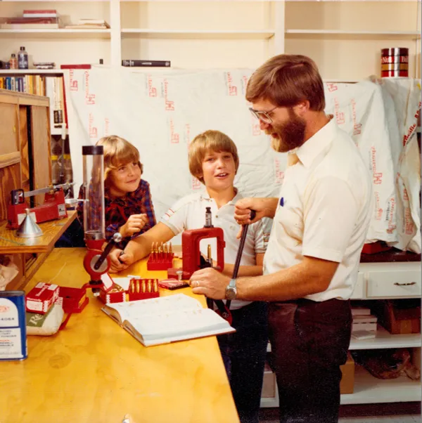 Photo of Steve Hornady & Children at Workbench