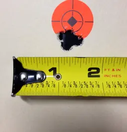 5 shots at 100 yds under a dime!